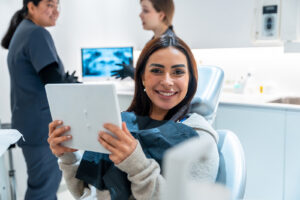 Patient reviewing dental information during a visit
